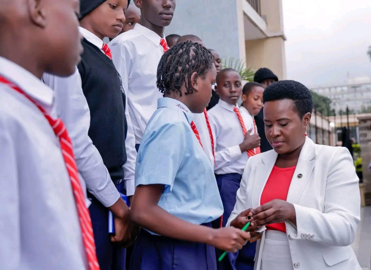 Sen. Essy Okenyuri interacting with St. Peter